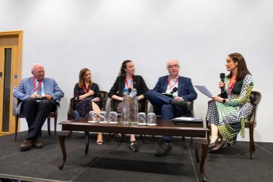Five panel speakers on stage